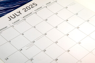 July 2025 calendar taken from a side angled view