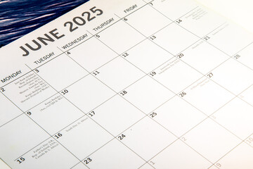 June 2025 calendar taken from a side angled view