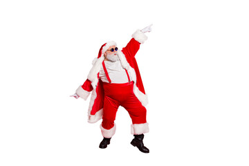Full length photo of handsome old dabber fat funny santa claus in eyeglasses dance with his hand raised wearing style stylish trendy trousers pants isolated over red background