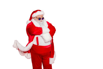 Photo of cool concentrated serious modern wearing fur cap holding arms crossed waiting for you flying coat suspenders trousers pants isolated bright background copy empty space