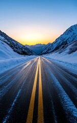Snow-covered mountain roads at sunrise