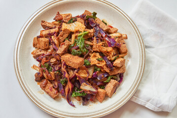 Delicious Stir-Fried Tofu with Colorful Vegetables on a Plate