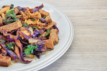 Delicious Stir-Fried Tofu with Colorful Vegetables on a Plate