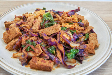 Delicious Stir-Fried Tofu with Colorful Vegetables on a Plate