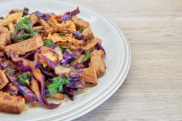 Delicious Stir-Fried Tofu with Colorful Vegetables on a Plate