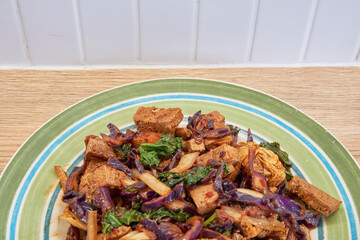 Delicious Stir-Fried Tofu with Colorful Vegetables on a Plate