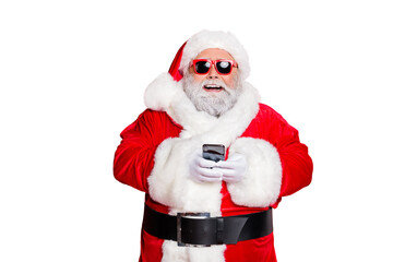 Close-up portrait of his he cheerful cheery glad funky fat overweight plump gray-haired bearded man using 5g app browsing blog smm isolated over bright vivid shine red background