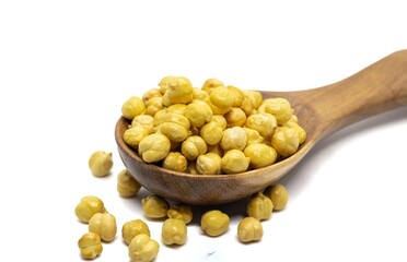 Roasted Chickpea or Garbanzo Bean in a Wooden Spoon Isolated on White Background with Copy Space, Also Known as Bengal Gram or Egyptian Pea