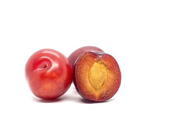 Closeup of Aloo Bukhara Fruit or Plum Fruit Isolated on White Background with Copy Space
