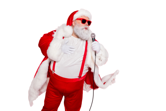 Portrait of charming fat overweaight santa claus with big belly hold microphone sing wear style stylish trendy eyewear eyeglasses hat cap isolated over red background