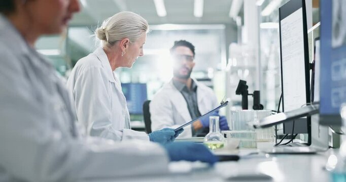 Clipboard, computer and science with team in lab for breakthrough, report or research. Collaboration, computer and innovation with people working together for pharmaceutical discovery or solution