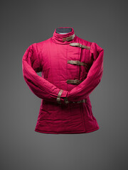 Historical fashion. Medieval knight cloth. Padded jacket gambeson.