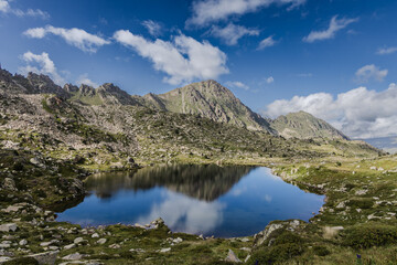 Estany del Cap dels Pessons, lake de Pessons in the Pyrenees mountains of Andorra, summertime