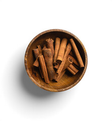 Wooden Bowl Filled with Cinnamon Sticks