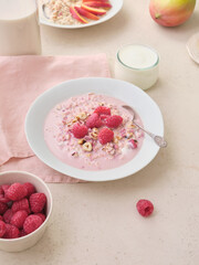 Overnight oats with various toppings. Fitness healthy organic breakfast in a bowl