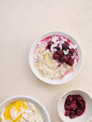 Overnight oats with various toppings. Fitness healthy organic breakfast in a bowl