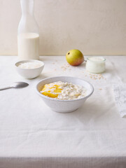 Overnight oats with mango and coconut topping. Fitness healthy breakfast in a bowl