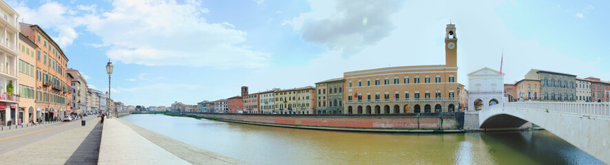 Naklejka premium Lungarno Galilei, the neighborhood along the bank of the Arno River in Pisa, Tuscany, Italy