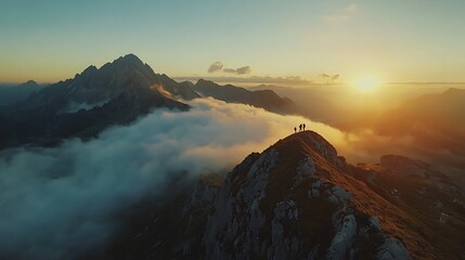 Peak Pursuit: Hikers Conquering Majestic Mountain at Sunrise with Dramatic Light and Clouds Below