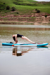 Sensual Woman with paddle board, sporty lifestyle.