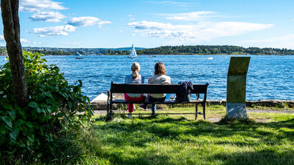 Couple In Olso Sat On a Bench