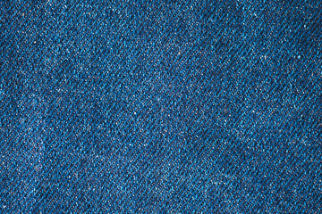 Navy blue color textured surface. Dark textile texture. Indigo color abstract grunge background