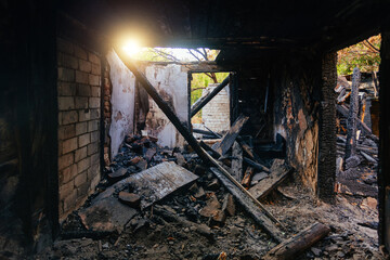 Consequences of fire. Burnt house