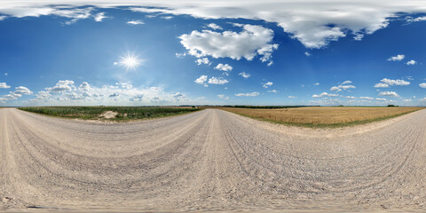 spherical 360 hdri panorama on side of gravel road with rain storm clouds in dark sky in equirectangular seamless projection, as skydome replacement in drone panoramas, game development