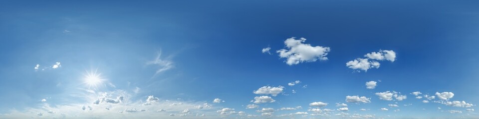 blue clear sky hdri 360 panorama with white clouds with zenith for use in 3d graphics as sky dome or edit drone shot as sky replacement