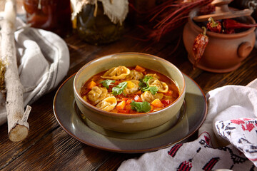 Marbled Beef Dumplings in Tomato Sauce Served in Rustic Setting