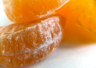 Macro Of Mandarin Orange Wedges With Bokeh