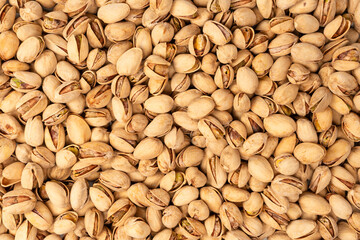 Tasty pistachios isolated on a white background.