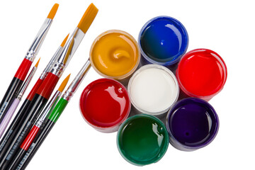 Paint brushes and paints gouache  isolated on white background. Top view.