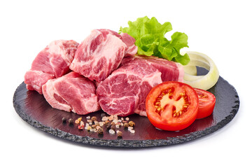 Raw pork pieces, isolated on white background
