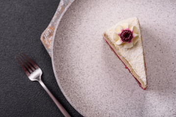 Sweet delicious cake with a layer of raspberry jam