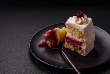 Sweet delicious cake with a layer of raspberry jam