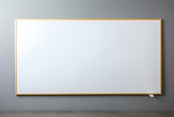 Obraz premium Blank Whiteboard with Gold Frame on Gray Wall