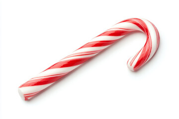Fototapeta premium Close-up of red and white striped candy cane isolated on white background for festive holiday decoration or Christmas celebration.
