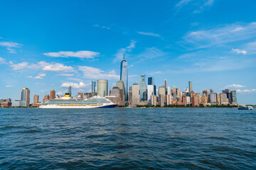 Fototapeta premium Cruise ship York. Skyline of New York Manhattan cruising on the Hudson River cruise liner. New york cruise lines ships vacation