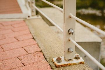 Details of the bridge. Metal fencing, flooring, fasteners, fittings