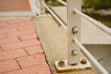 Details of the bridge. Metal fencing, flooring, fasteners, fittings