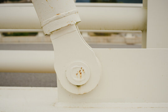 Details of the bridge. Metal fencing, flooring, fasteners, fittings
