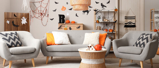 Interior of stylish living room decorated for Halloween