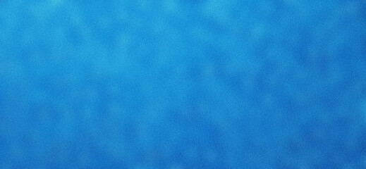 Blurred background of water drops on blue background with grainy texture