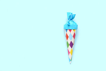 School cone on blue background
