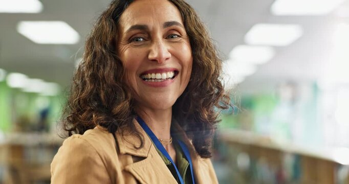 Mature woman, happy and tablet in library for education, knowledge and career in school. Child therapist, smile and portrait in book room for outsource consultation, student information and academics