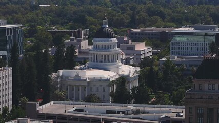 California State Capitol building on a sunny day in Sacramento. The California State Capitol stands as a historic edifice, combining neoclassical architecture with the functions of state government.