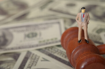 The image could symbolize the relationship between wealth and justice, or the potential for...