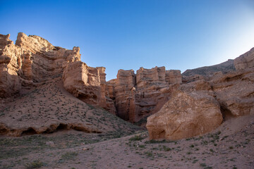 Fototapeta premium A stunning Charyn canyon in the desert beneath a bright blue sky