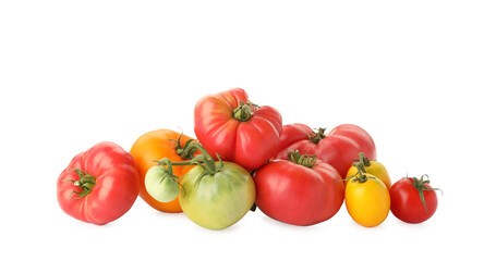 Different sorts of fresh ripe tomatoes isolated on white